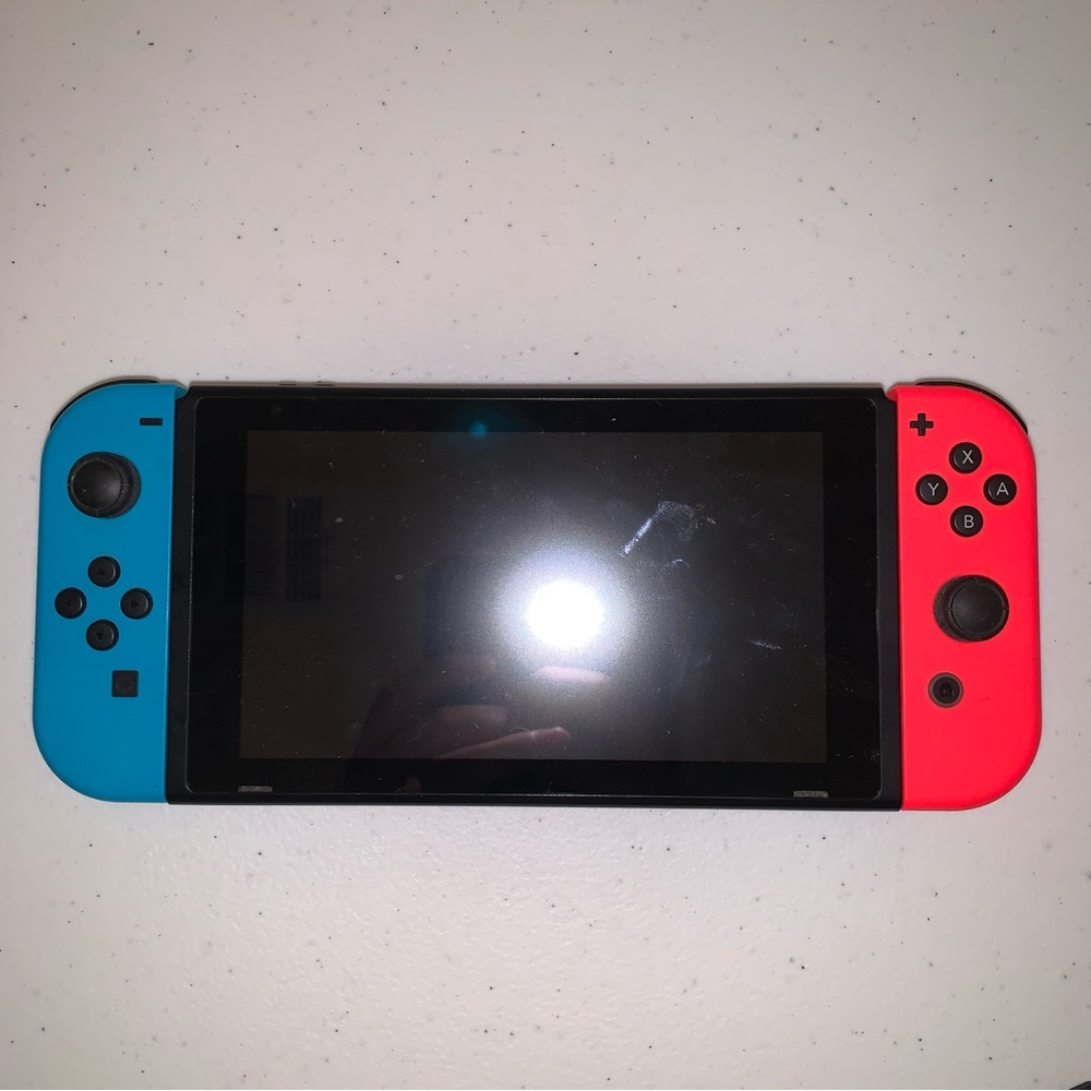 Nintendo switch console with charger